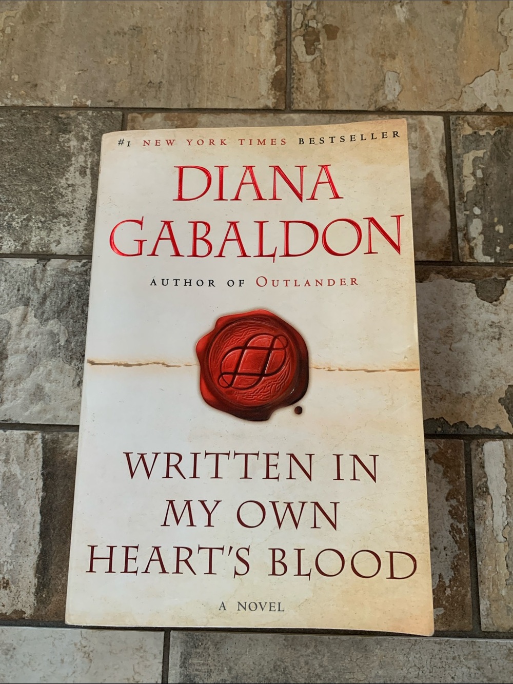 “WRITTEN IN MY OWN HEART’S BLOOD” by DIANA GABALDON